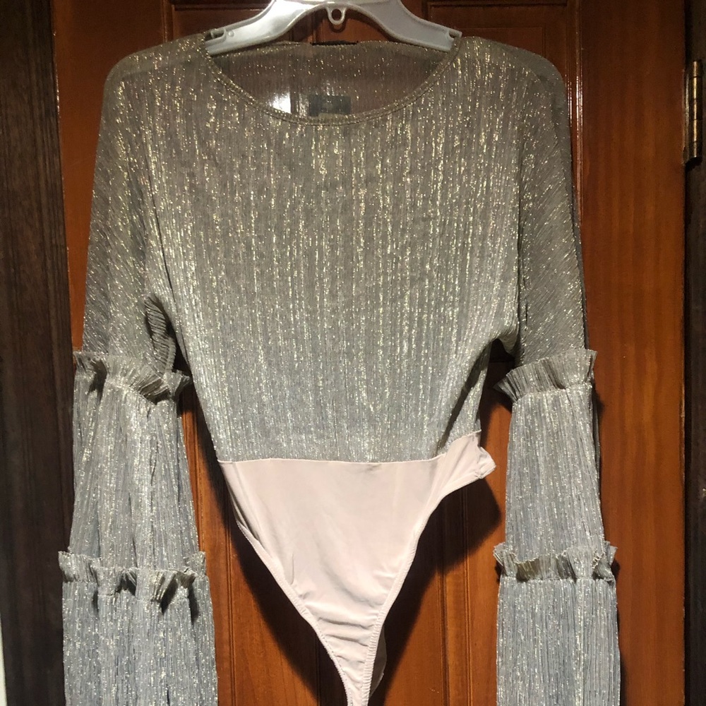 Brand new Gold shimmer body suit